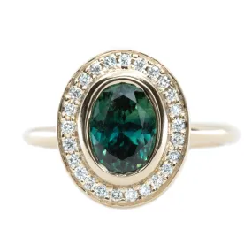 1.72ct Teal Color Change Sapphire Bezel Set Diamond Halo in 14k Yellow Gold